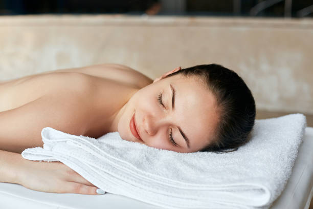 istock Massage. Beautiful girl in spa salon 1170563277
