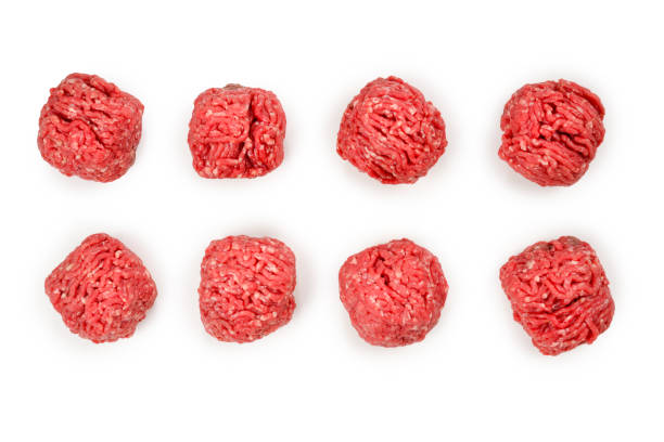 istock Raw meat balls isolated on white background. 1170563453