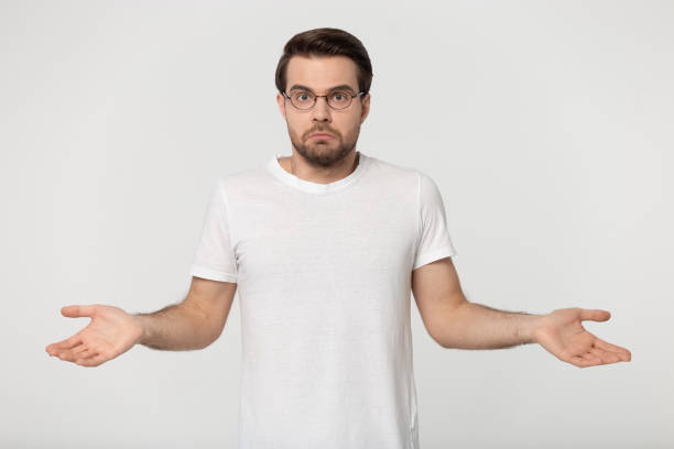 istock Guy in perplexity shrugged his shoulders studio shot 1170564005