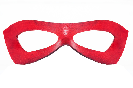Red superhero mask on a white background.