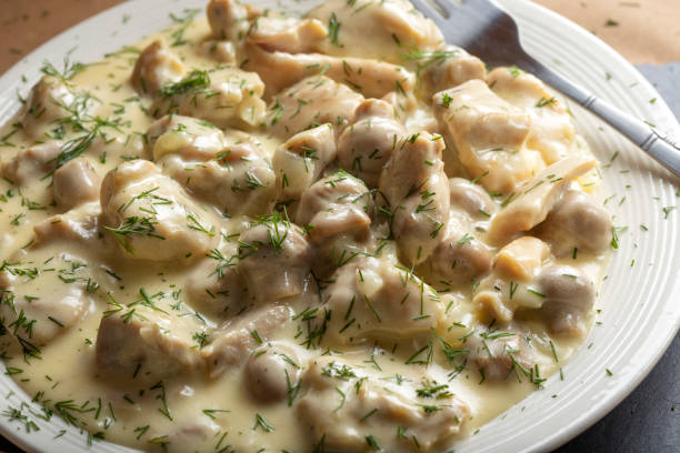 istock Chicken meat with mushrooms, cream and dill 1170568309