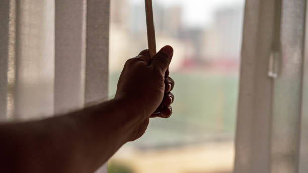 istock man opening a claw with his hand 1170572579