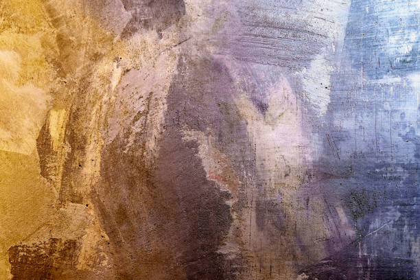 istock Grungy concrete wall with colorful lighting. 1170575009
