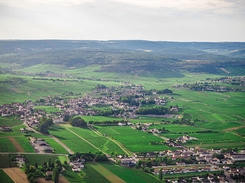 Aerial view of Meursault village in the middle of vineyards in Burgundy, France