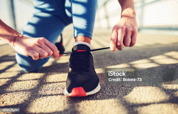 Tying Sports Shoes Sport Exercise Fitness Workout Stock Photo - Download Image Now