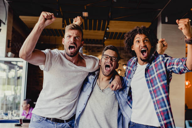 istock friends are watching a sports 1170576086