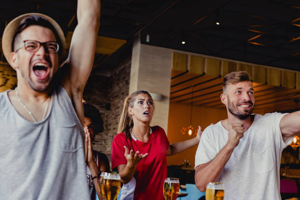 istock friends are watching a sports 1170576087