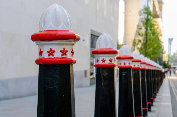 istock Bollards along a footpath to prevent parking in London. 1170576130