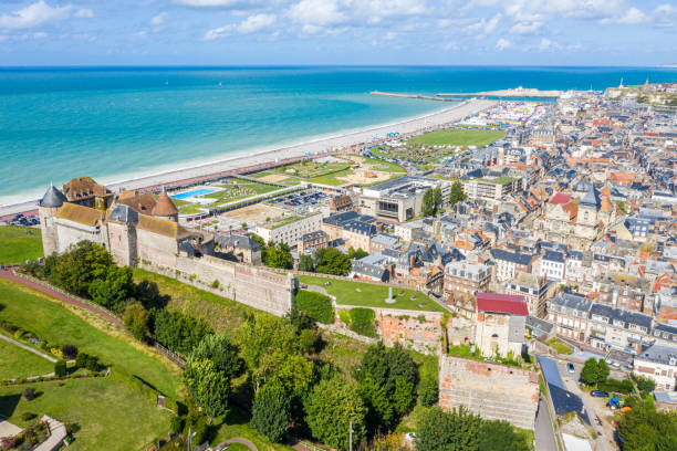 Aerial view of Dieppe town, the fishing port on the English Channel, at the mouth of Arques river. On a clifftop overlooking pebbly Dieppe Beach is the centuries-old Chateau de Dieppe, now the museum stock photo