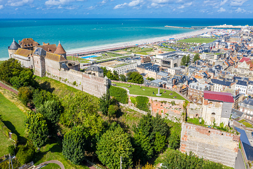 Aerial view of Dieppe town, the fishing port on the English Channel, at the mouth of Arques river. On a clifftop overlooking pebbly Dieppe Beach is the centuries-old Chateau de Dieppe, now the museum.