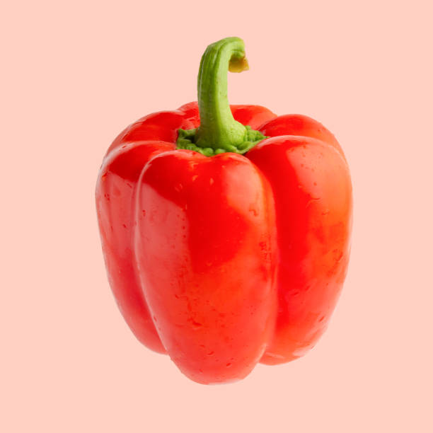 istock red bell pepper or paprika isolated on a pink background, for design 1170579038