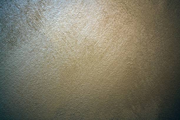 istock A spot of light on a textured pearl plaster. 1170579115