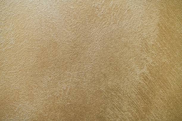 istock Textured pearl plaster on the wall. 1170580126