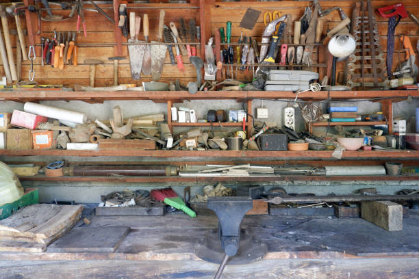 istock Wooden workbench of a carpenter at workshop. 1170580334