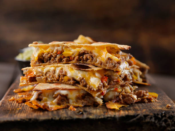 Cheesy Beef Taco Quesadilla Cheesy Beef Taco Quesadilla ground beef photos stock pictures, royalty-free photos & images