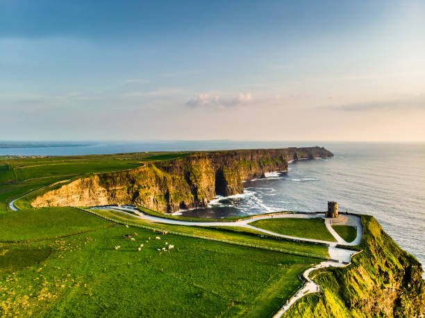 World famous Cliffs of Moher, one of the most popular tourist destinations in Ireland. Aerial view of known tourist attraction on Wild Atlantic Way in County Clare. stock photo