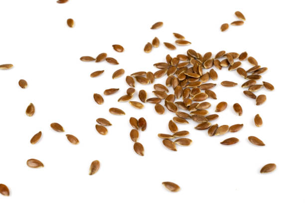 istock Linseeds. Flax seeds isolated on white background. Top view 1170581496