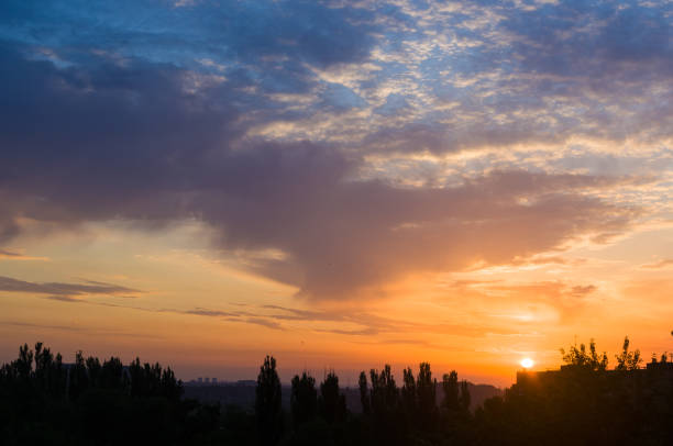 istock Landscape with dramatic light - beautiful golden sunset with saturated sky and clouds. 1170581499