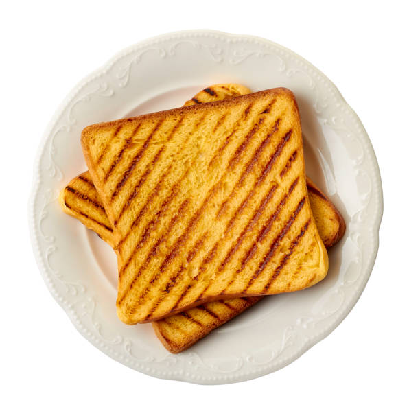 istock Dish with two roasted slices of bread on white 1170583867