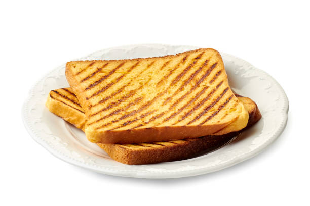 istock Dish with two roasted slices of bread on white 1170583913