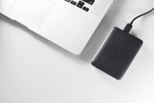 istock laptop and mobile hard drive 1170584900