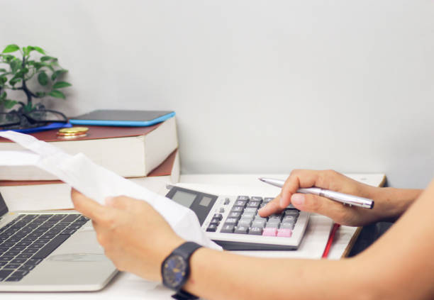 istock Business people are paying online shopping with a laptop computer. 1170591399