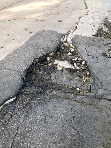 istock A Pothole on the Side of a Road 1170595344