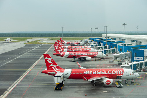 Kuala Lumpur, Malaysia. Air Asia Airbus aircraft in the courtyard of Kuala Lumpur Airport, Malaysia during peak season. January 2019