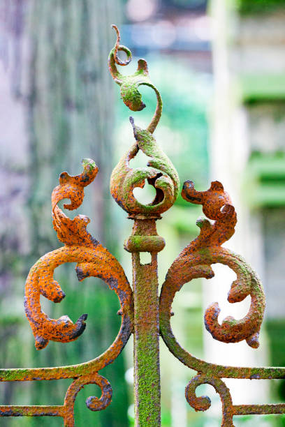 istock Detail of old rusty cast iron ornate gate, background with copy space 1170596684