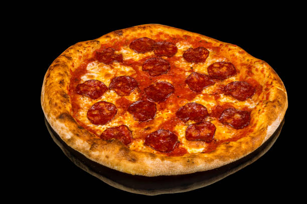 istock Pepperoni pizza on black glass with reflection 1170597270