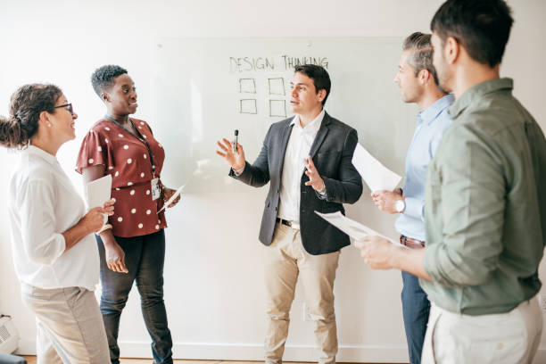 istock Mentoring new business group 1170597643