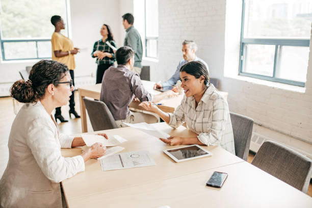 istock Networking moment in coworking facility 1170598717