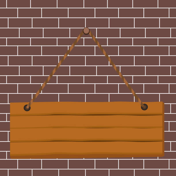 istock Hanging empty wooden plank board pinned by a nail with string. Rectangle shaped wood sign attached at two ends on colorful background. Blank panel fixed on surface. 1170598770