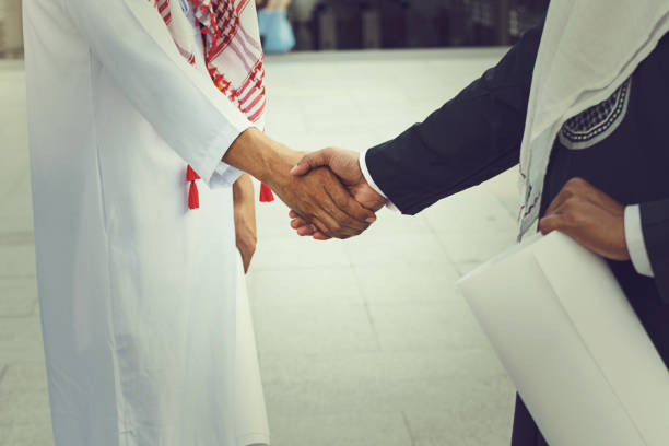 istock Arab businessmen worker handshaking on construction site 1170607098