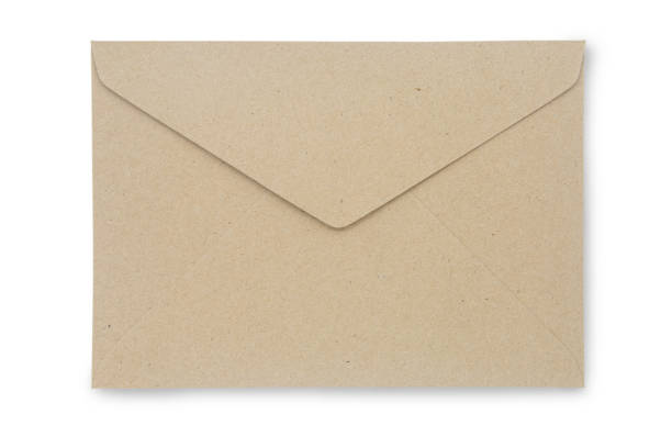 istock Close up Kraft Paper envelope isolated on white background with clipping path. Kraft Paper envelope di cut with path simply use to create your any design. 1170608762