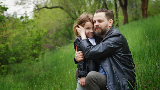 istock Dad and daughter spend time together in park 1170615504