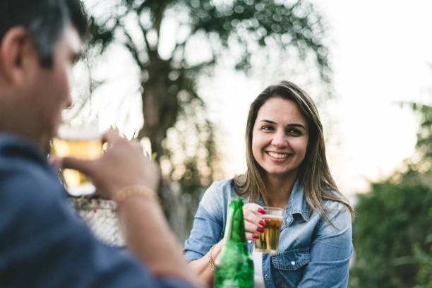 istock Couple drinking a beer at rural inn bar 1170616630