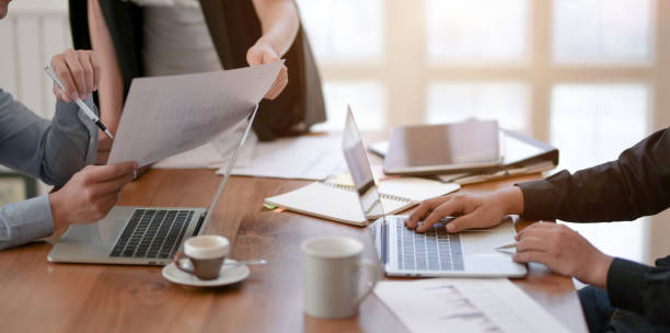 istock A group of business people working on their project together 1170616786