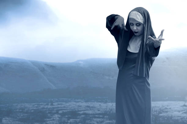 istock Frightening devil nun on the spooky hills 1170624885