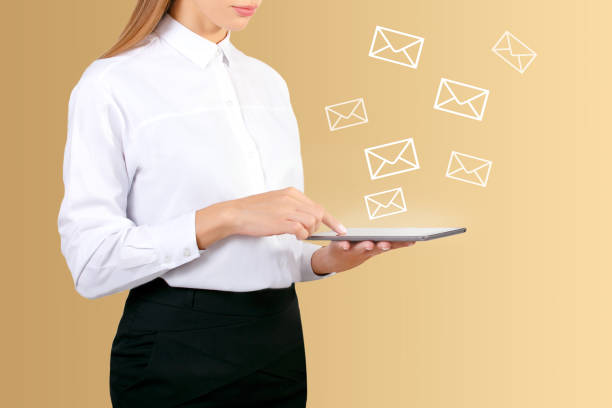 istock Woman hand using digital tablet to send email for business. 1170628152