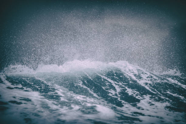 istock Fishing boat trawler sailing out at rough sea 1170633604