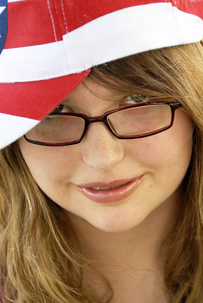 istock Smiling Girl with Glasses 117063466