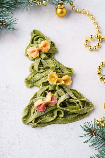 istock Christmas tree made of fresh homemade spinach pasta. 1170637102