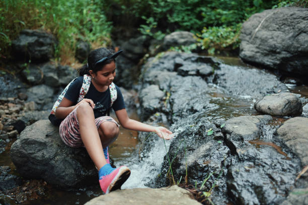 istock Tweenage girl having fun outdoors 1170637170