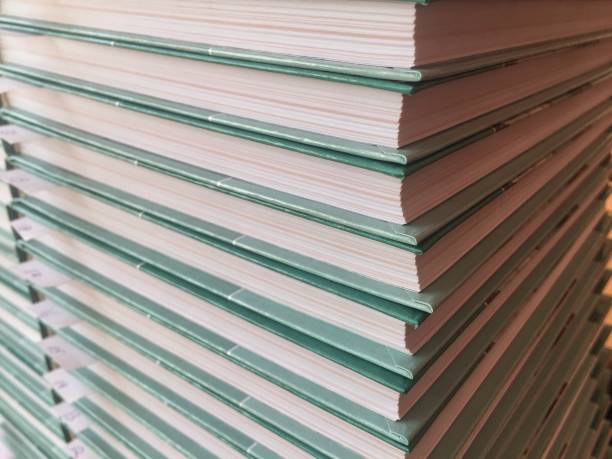 istock Smooth stacks of textbooks on the table close-up 1170637877