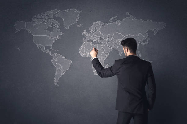 istock Businessman with world map 1170640367