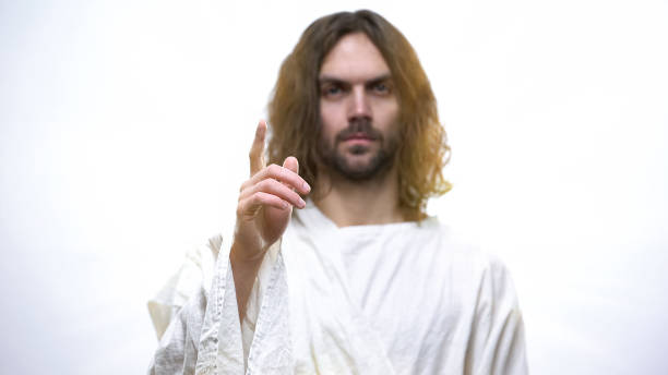 istock Jesus raising finger, warning against sin, teaching Christians righteous life 1170641607