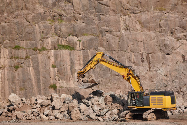 istock Excavator working on a stone quarry. Geological excavation equipment 1170643414
