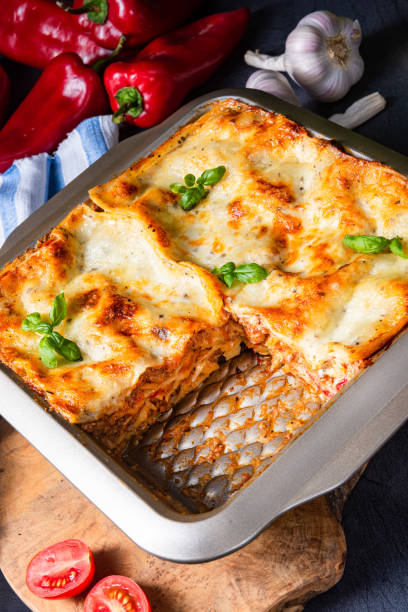istock rustic spicy lasagne with basil on the tin. 1170646128