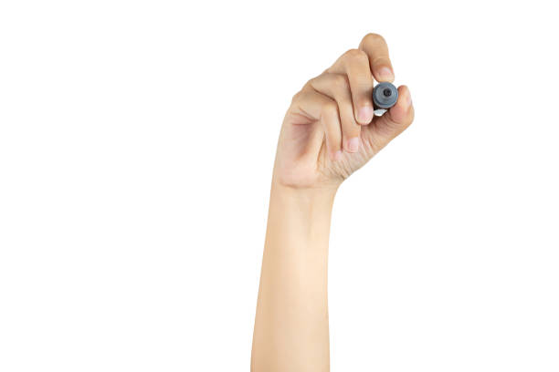 istock hand holding black magic marker pen ready to writing something isolated on white background with copy space, studio shot, front view 1170651236